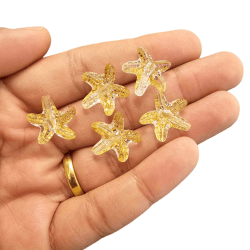 CONTAS DO MAR -TRANSPARENTE C/ DOURADO - 25GR 